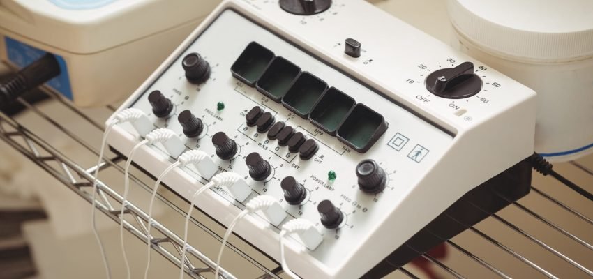 Close-up of electro stimulation device in clinic